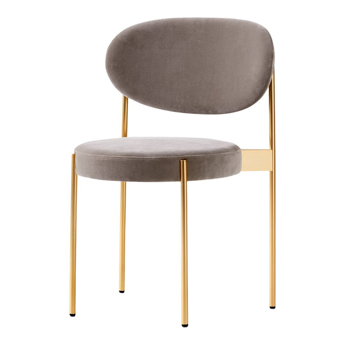 Stylish gray velvet chair with sleek gold metal legs, featuring a smooth, modern design perfect for any decor.