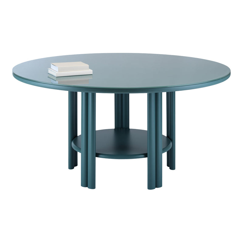 Round teal coffee table with a glossy surface, featuring a minimalist design and matching cylindrical legs.