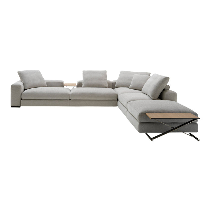 Light gray sectional sofa with soft fabric, featuring clean lines and a minimalist design. Modern and stylish addition.