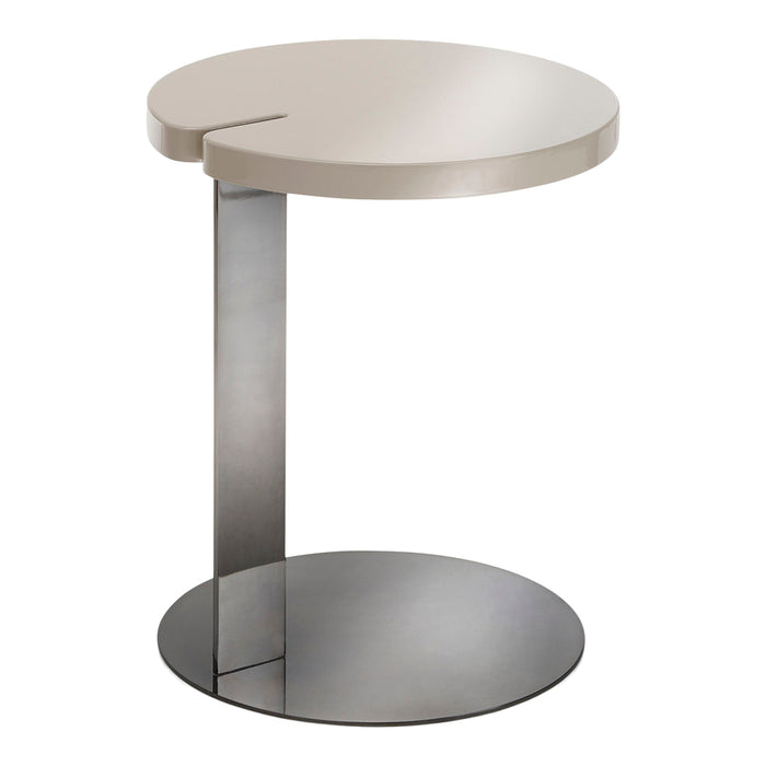 Sleek round side table with a smooth beige top and a polished silver base, featuring a modern cut-out design.