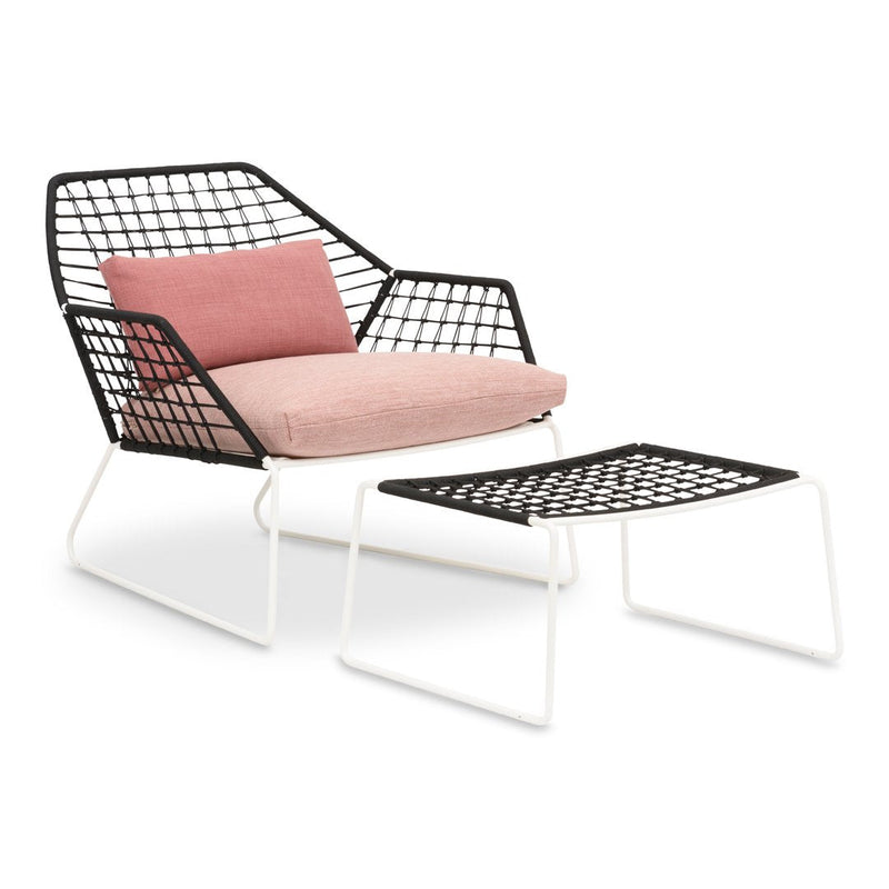 Black grid-patterned chair with a soft pink cushion and matching ottoman, featuring white metal legs.