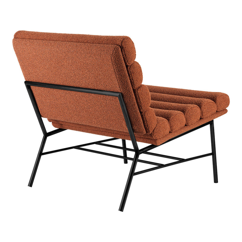Retro orange chair with textured fabric and sleek black metal frame, featuring vertical buttoned upholstery.