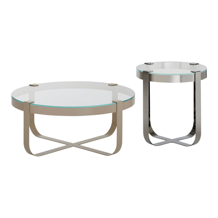 Stainless steel and glass accent tables with sleek, modern design in silver and beige tones. Perfect for contemporary decor.