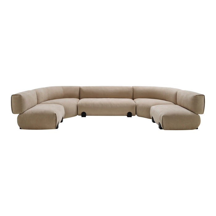 Beige curved sectional sofa with a smooth texture and modern design, featuring soft, neutral tones for versatile decor.