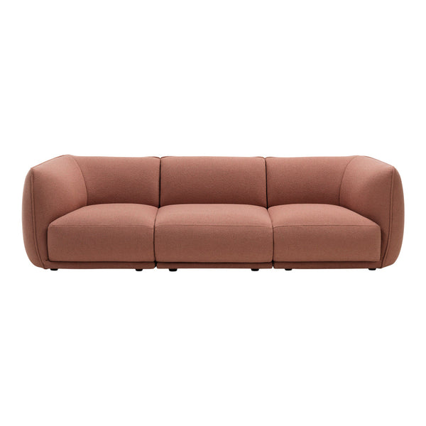 Soft terracotta sofa with smooth, rounded edges and a minimalist design. Perfect for modern interiors.