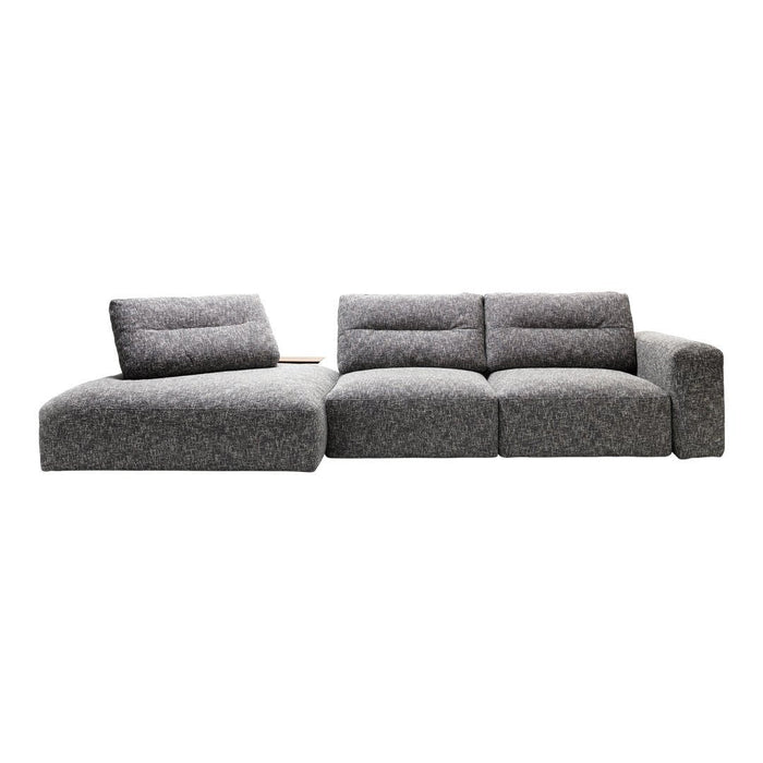 Modern grey sectional sofa with textured upholstery and subtle pattern for a stylish living space.