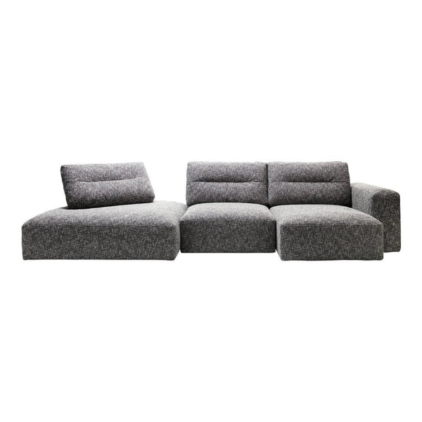 Modern grey sectional sofa with soft, textured fabric and minimalist design. Ideal for contemporary living spaces.