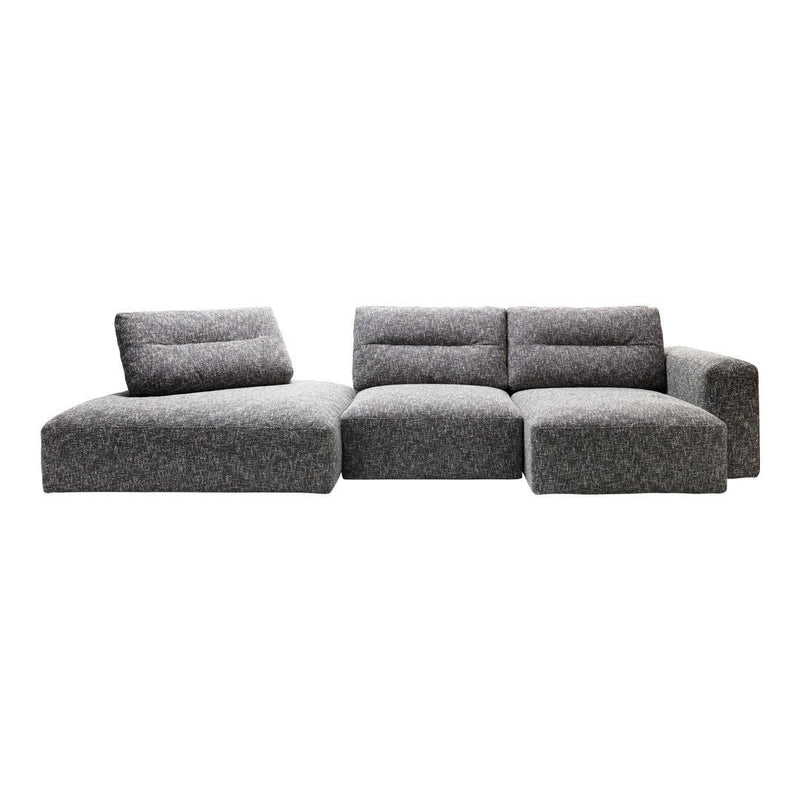 Modern grey sectional sofa with soft, textured fabric and minimalist design. Ideal for contemporary living spaces.