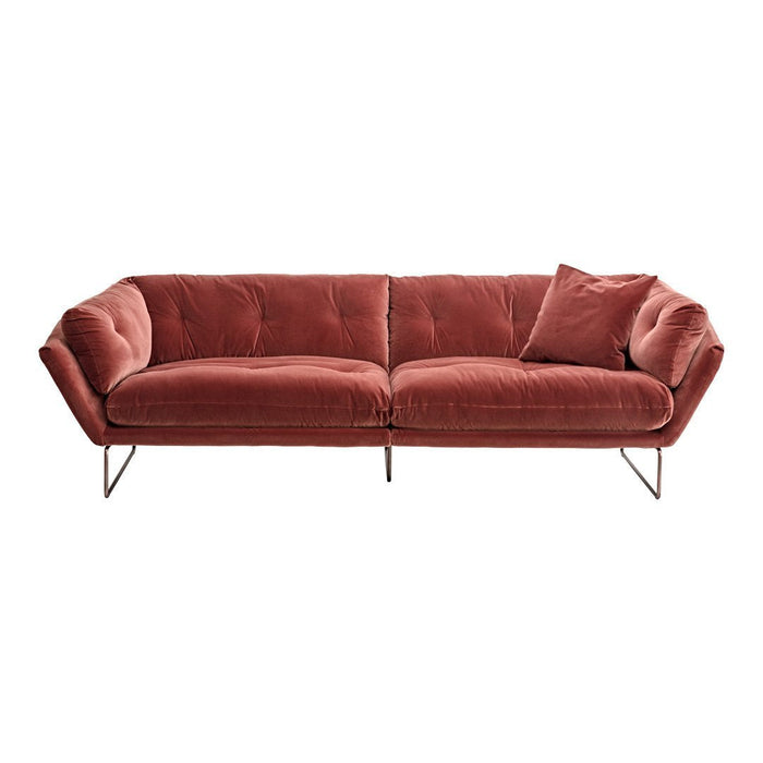 Velvet sofa in warm terracotta hue with plush, tufted design and sleek metal legs, perfect for modern decor.