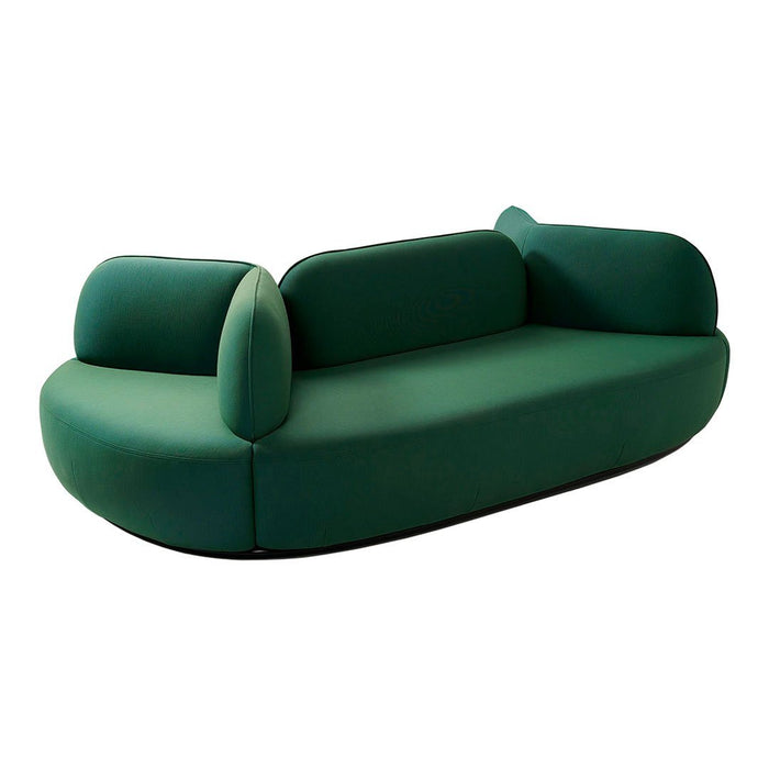 Green minimalist sofa with smooth curves and a modern design, featuring a solid color without patterns.