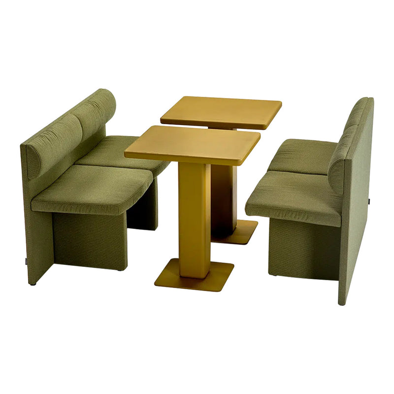 Green upholstered seating with a smooth gold table, featuring minimalist design and soft, modern patterns.