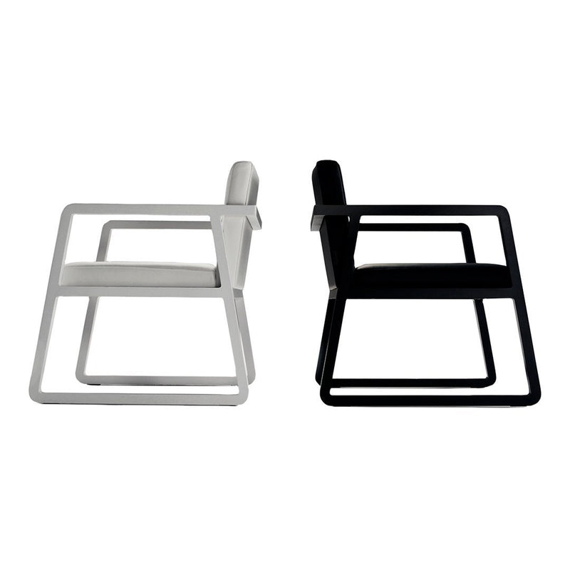 Black and white modern chairs with sleek metal frames and minimalist designs. Ideal for contemporary spaces.