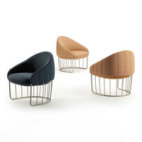 "Three modern chairs in navy, warm beige, and light orange with unique wire base designs."