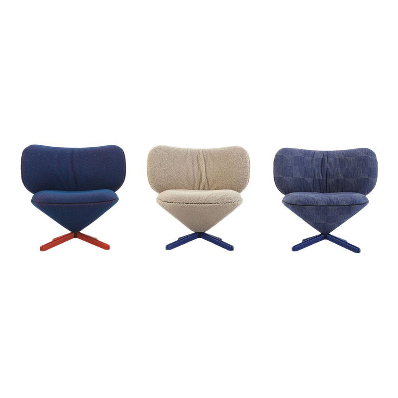 "Set of three modern chairs in navy, beige, and deep blue with contrasting base colors and soft, textured upholstery."