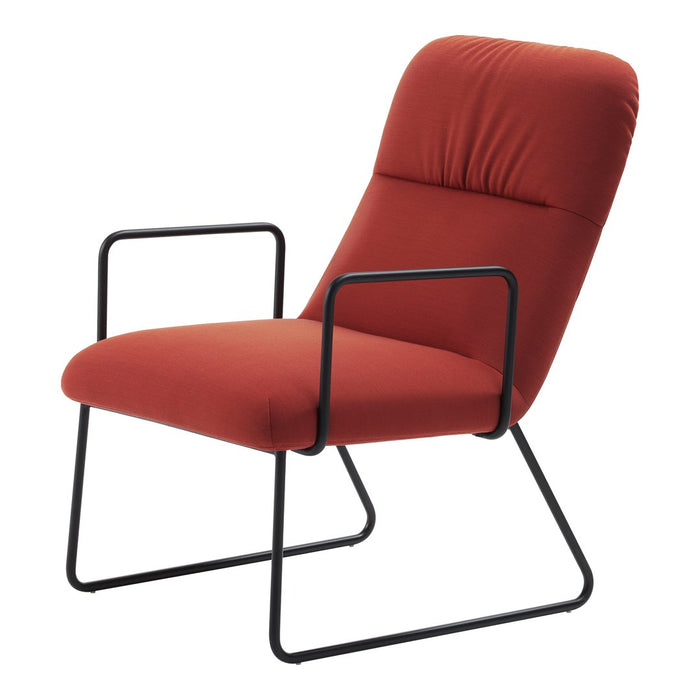 Red upholstered chair with a minimalist design and black metal frame, showcasing a smooth texture and clean lines.