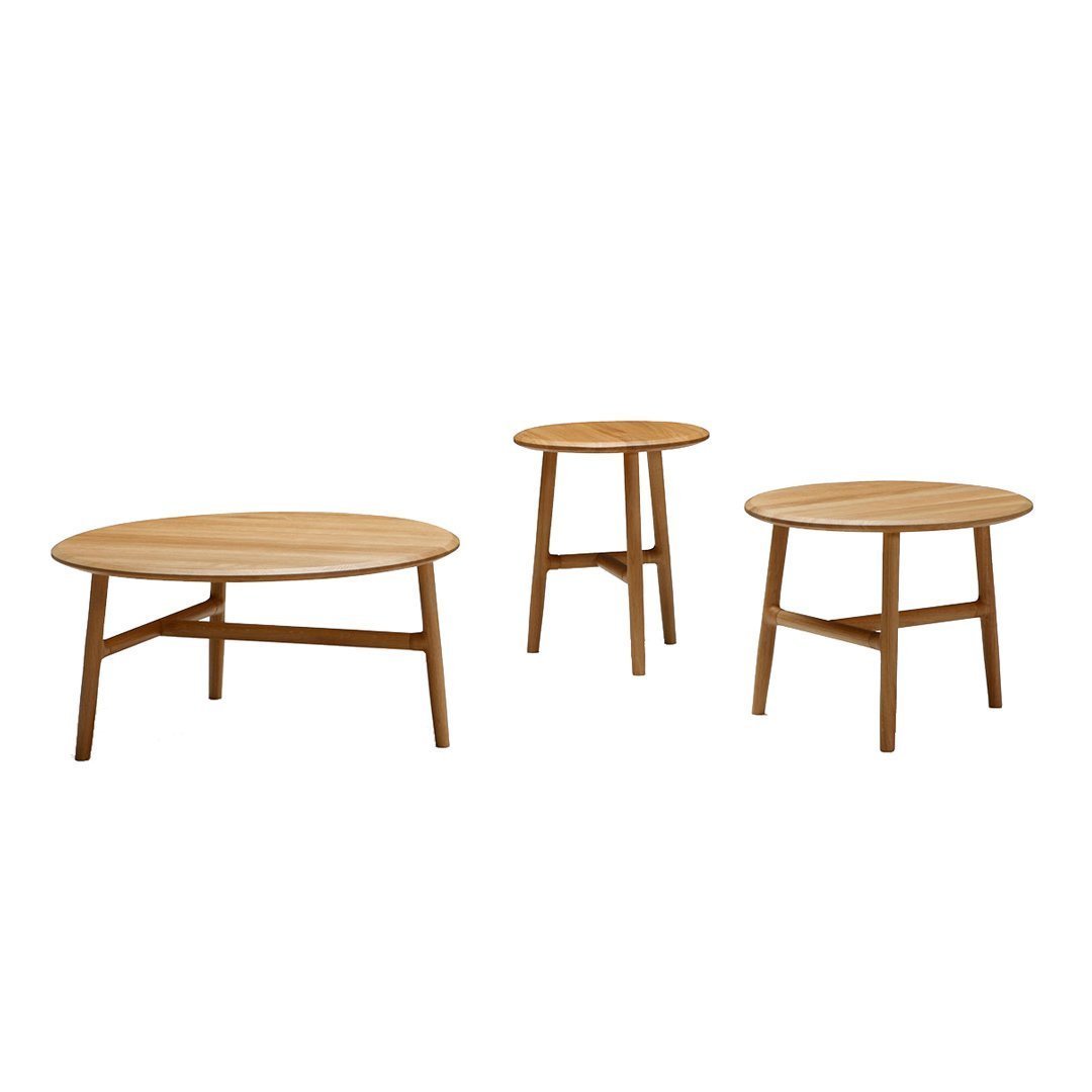 Natural wood coffee table set in light oak finish with smooth surfaces and minimalist design. Perfect for modern decor.