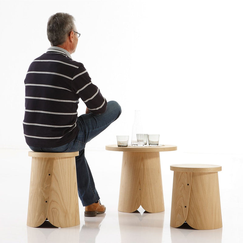 Natural wood stool set with smooth, rounded edges, showcasing a light beige color and subtle grain patterns.