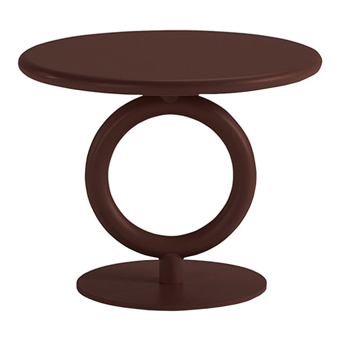 Brown circular side table with a unique round base, featuring a smooth, matte finish. Ideal for modern decor.