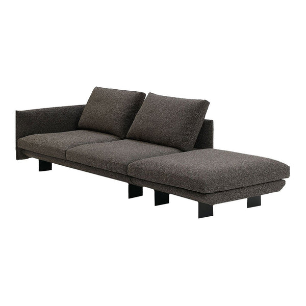 Gray sectional sofa with textured fabric and clean lines, featuring a modern minimalist design.