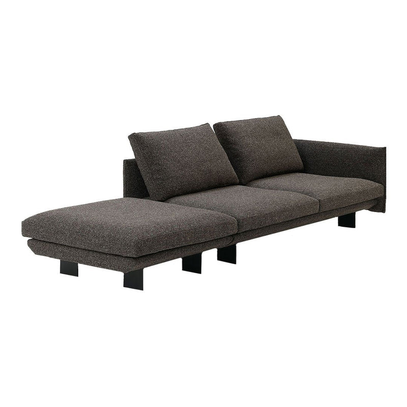 Modern dark gray sectional sofa with minimalist design and plush fabric upholstery. Adjustable back cushions for comfort.