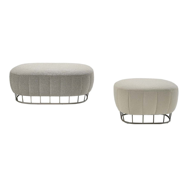 Set of two round ottomans in neutral beige and light gray shades with textured patterns and metal wire bases.