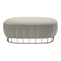 Gray upholstered oval ottoman with a textured pattern and a sleek metal base. Ideal for modern decor.