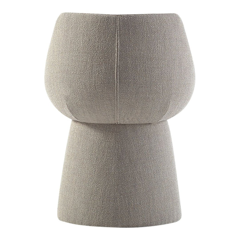 Light beige sculptural stool with a smooth, textured finish, featuring a minimalist design and soft, neutral tones.