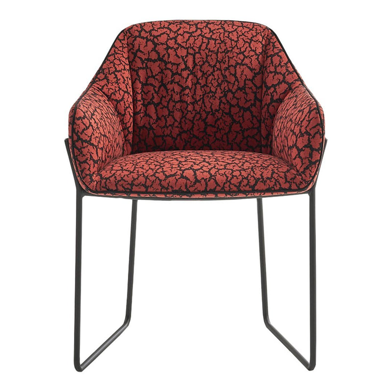 Stylish red chair with a cracked black pattern, featuring a sleek metal frame. Perfect for modern decor.