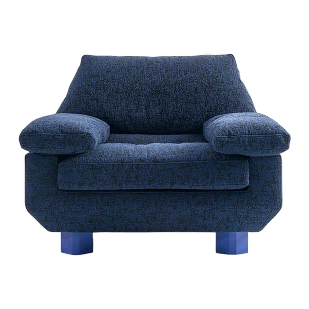 Blue-textured armchair with soft, cozy cushions and bold blue legs, perfect for modern decor.