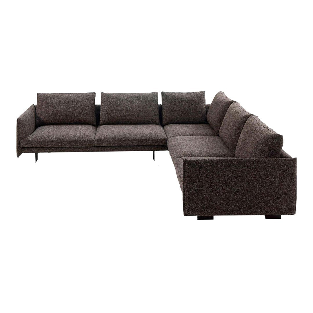 Sleek dark brown sectional sofa with modern fabric texture and clean lines, perfect for contemporary living spaces.