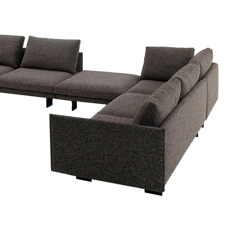Gray sectional sofa with a textured fabric and clean lines, suitable for modern living spaces.