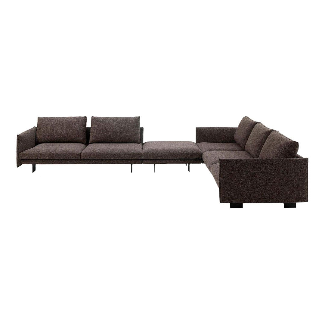 Brown sectional sofa with a minimalist design, featuring textured fabric and clean lines for a modern look.