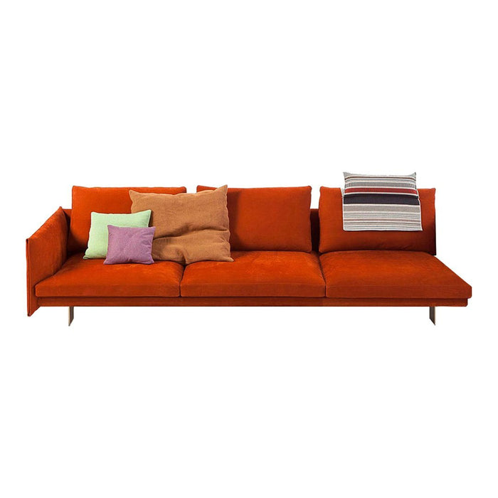Vibrant orange sofa with assorted throw pillows in green, purple, beige, and striped patterns for a stylish accent.