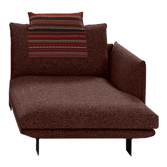 Brown lounge chair with textured fabric and a striped accent pillow in warm colors. Modern and cozy design.