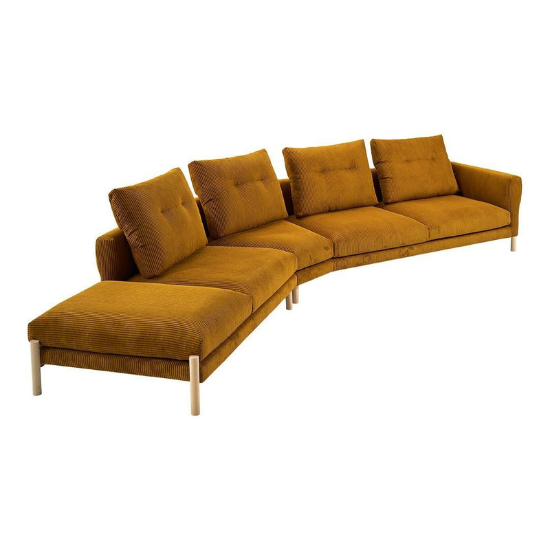 Curved mustard yellow sofa with plush cushions and a smooth texture, featuring a minimalist design.
