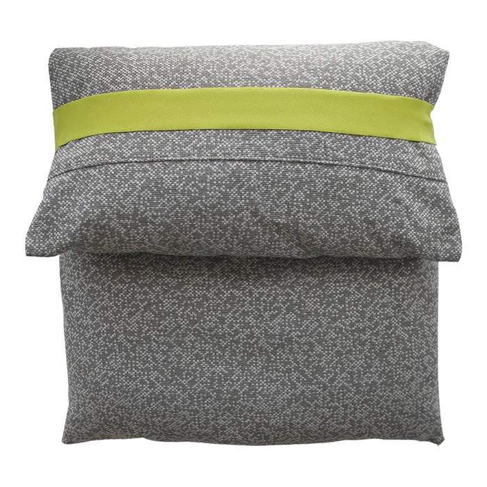 Gray patterned pillow with a vibrant lime green ribbon accent and textured design for a modern look.