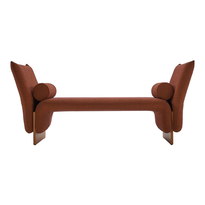 Rust-colored modern bench with smooth lines and rounded armrests, featuring a minimalist design.