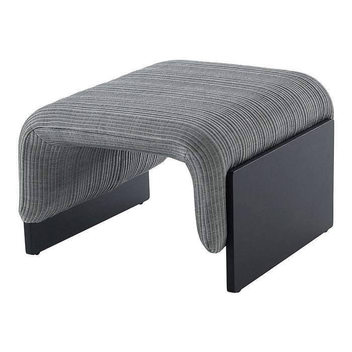 Gray striped fabric ottoman with sleek black wooden accents, perfect for modern interiors.