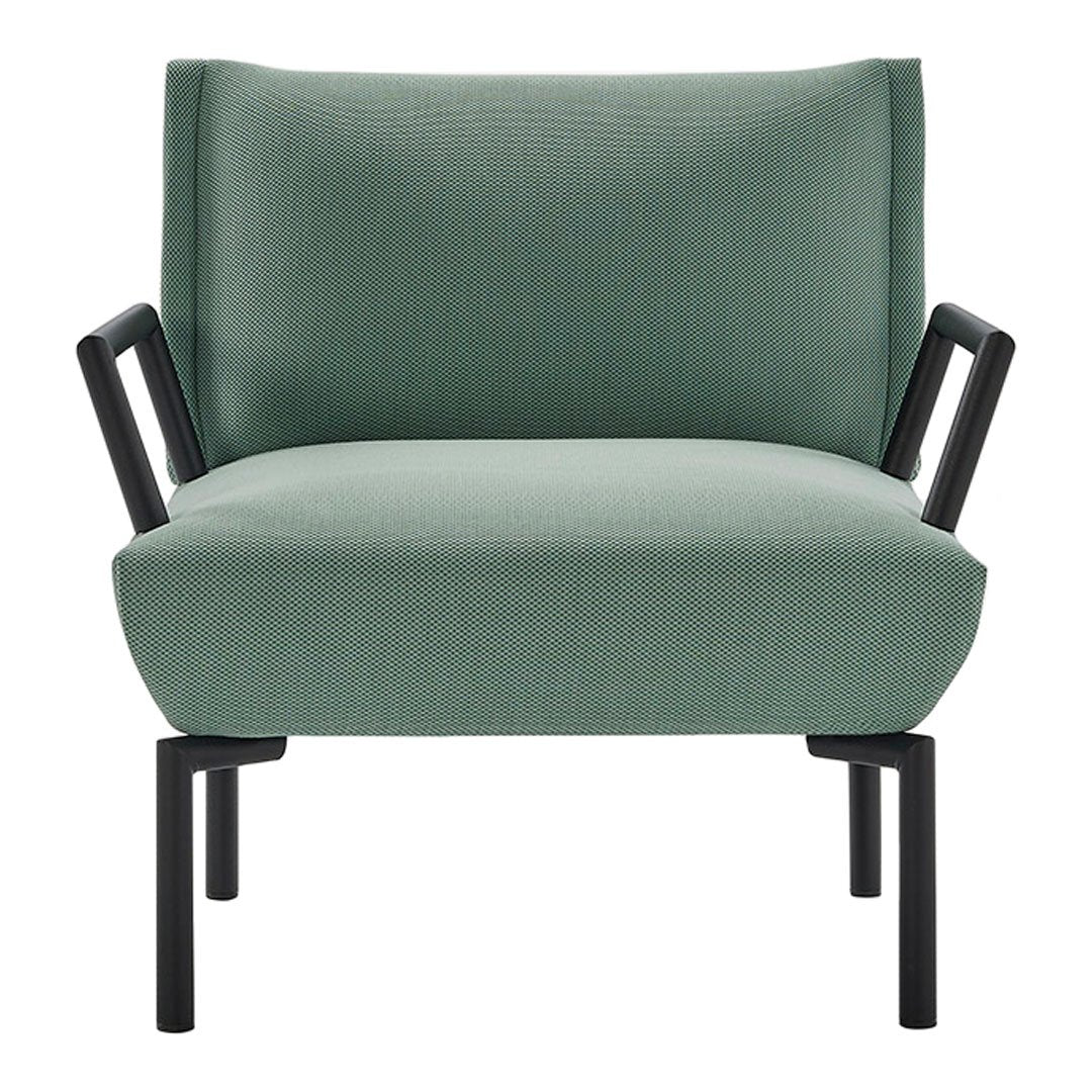 Mint green upholstered chair with sleek black metal frame and minimalist design. Perfect for modern interiors.
