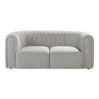 Gray curved sofa with vertical ribbed pattern and plush cushioning for modern decor.