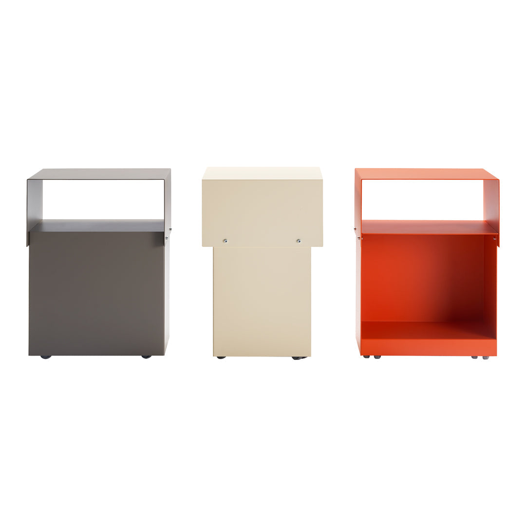 Set of three modern nightstands in gray, cream, and vibrant orange, showcasing sleek lines and minimalistic design.