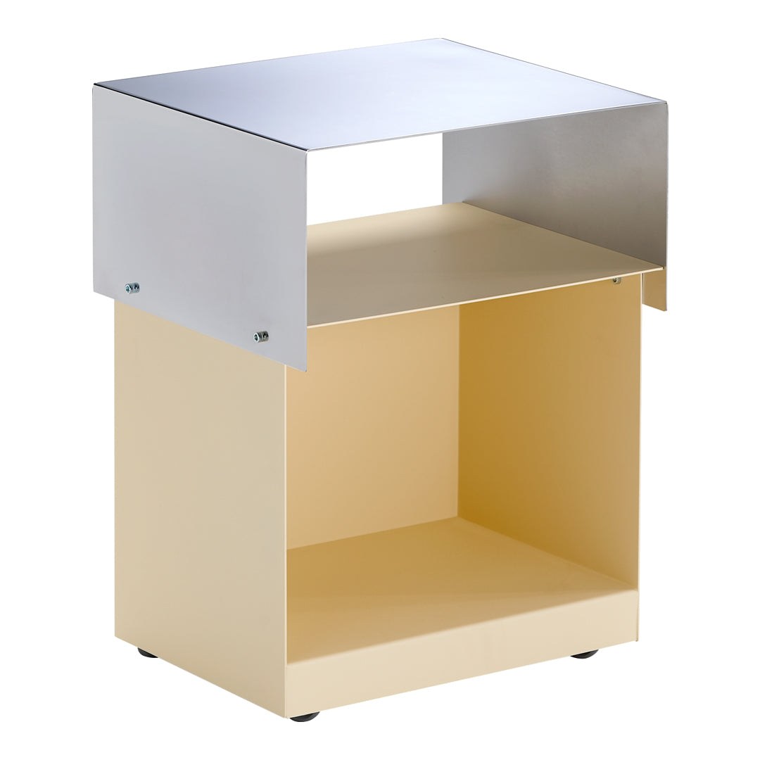 Modern two-tone side table in soft yellow and sleek silver with a minimalist design and open shelving.