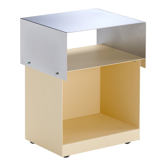 Modern two-tone side table in soft yellow and sleek silver with a minimalist design and open shelving.
