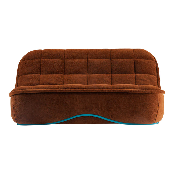 Brown plush sofa with a quilted design and a contrasting blue trim. Ideal for stylish, contemporary interiors.