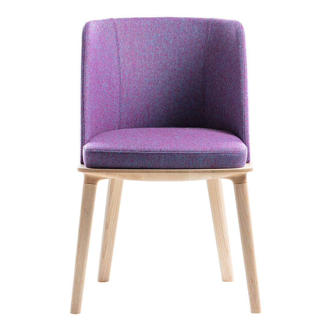 Purple and lilac patterned upholstered chair with natural wood legs. Modern design for stylish decor.