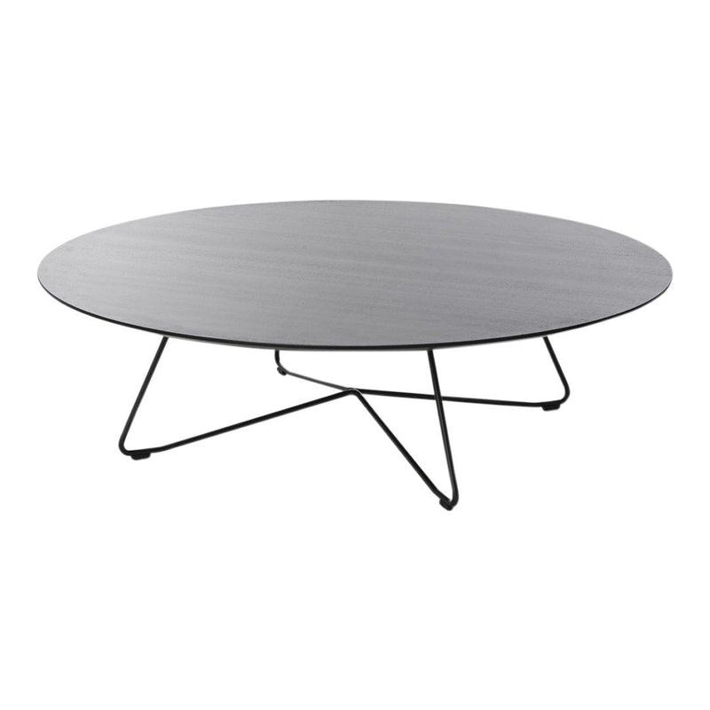 Round coffee table with a sleek gray surface and minimalist black metal legs for modern decor.