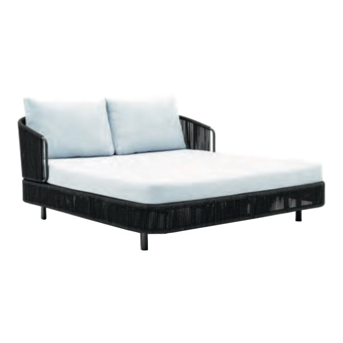 Black wicker daybed with light blue cushions, featuring a sleek, modern design and minimalist pattern.