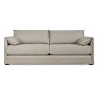 Light beige upholstered sofa with minimalist design and plush back cushions, featuring a smooth, textured fabric.