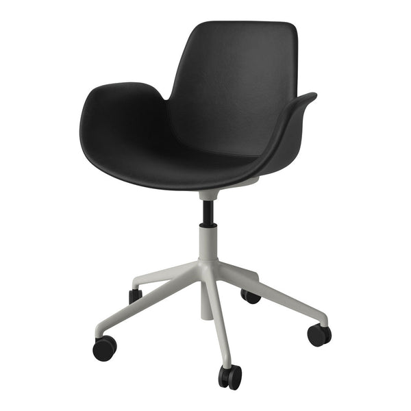 Black ergonomic chair with a sleek matte finish and a contrasting light gray five-star base.