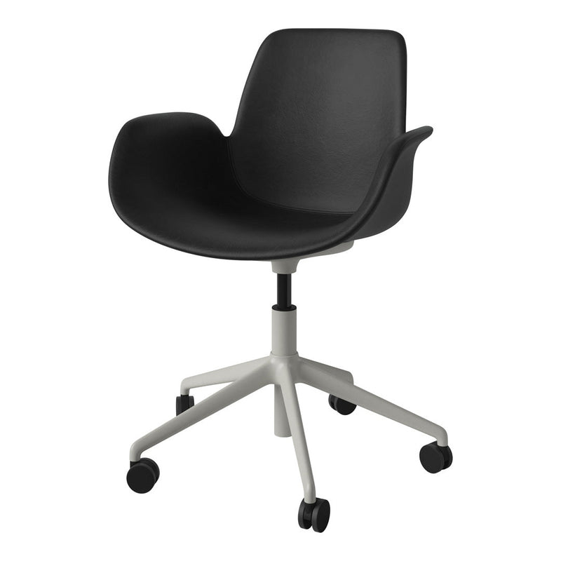 Black ergonomic chair with a sleek matte finish and a contrasting light gray five-star base.